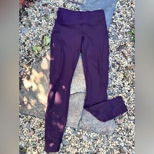 Lululemon  in size 4 fleece lined pants. Great condition.